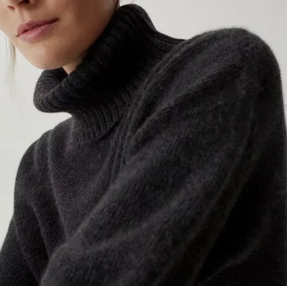 Close-up of the charcoal Mabel turtleneck collar